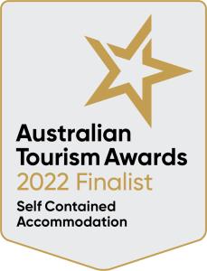 a sign that says australian tourism awards finalist at Bandalong Cottages in Mudgee