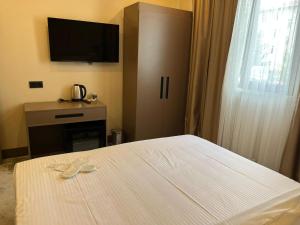 Postel nebo postele na pokoji v ubytování Istanblu Hotel Ataşehir