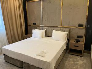Postel nebo postele na pokoji v ubytování Istanblu Hotel Ataşehir