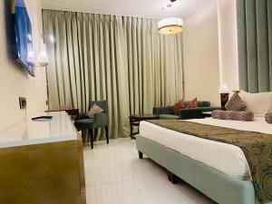 Voodi või voodid majutusasutuse Evershine Resort & Spa toas