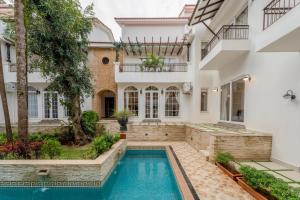 Bazén v ubytování Casa Del Leon by Hireavilla -3BR w pool in Assagao nebo v jeho okolí