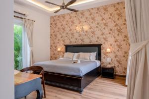 Postel nebo postele na pokoji v ubytování Casa Del Leon by Hireavilla -3BR w pool in Assagao