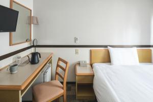 东京浅草筑波快速船舶酒店(Vessel Inn Asakusa Tsukuba Express)房間的床