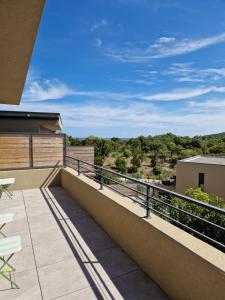 a view from the balcony of a house at Villa Favone 4 chambres piscine privée in Conca