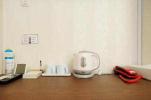 a kitchen counter with a coffee maker and a phone at Hotaku HOTEL - Vacation STAY 98852v in Tokyo