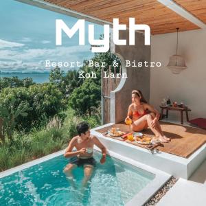 a magazine cover with two people sitting in a swimming pool at Myth Koh Larn resort bar and bistro in Ko Larn