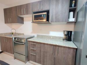 Kuchyň nebo kuchyňský kout v ubytování Condo en Jacó