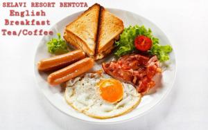 a plate of breakfast food with eggs sausage and toast at Selavi Resort Bentota in Bentota