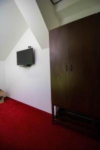 TV a/nebo společenská místnost v ubytování Hostel Aurora