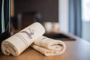 Rúm í herbergi á Feiserhof Navis - Appartements