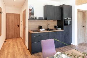 Eldhús eða eldhúskrókur á Feiserhof Navis - Appartements