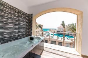 Bazén v ubytování KaiSol Romance Resort Sahl Hasheesh - Adults Only nebo v jeho okolí + 37 fotografií