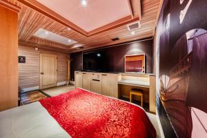 Postel nebo postele na pokoji v ubytování Hotel Atlantis Machida -Adult Only