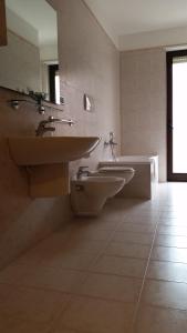 Bilik mandi di Ciao Hotel & Residence - Apartments