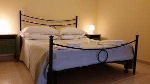 Katil atau katil-katil dalam bilik di Ciao Hotel & Residence - Apartments