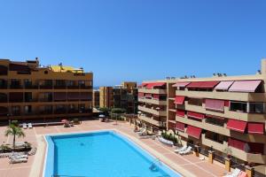 Bazén v ubytování Estupendo apartamento nebo v jeho okolí