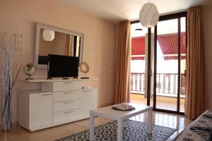 TV a/nebo společenská místnost v ubytování Estupendo apartamento