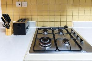 Cuina o zona de cuina de Amazing Studio with Balcony & Beach access-RAK