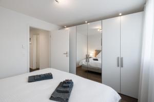 Postel nebo postele na pokoji v ubytování Schöne Parterrewohnung in Matten