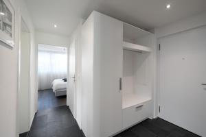 Letto o letti in una camera di Schöne Parterrewohnung in Matten