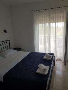 Posteľ alebo postele v izbe v ubytovaní Apartments D&D
