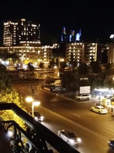 a view of a city at night with cars at Квартира в престижном районе Баку in Baku