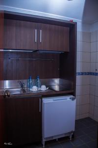 Kuchyň nebo kuchyňský kout v ubytování New Heaven Hôtel