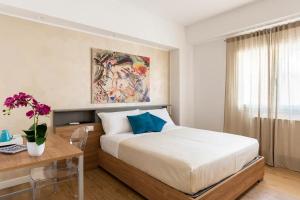 Ένα ή περισσότερα κρεβάτια σε δωμάτιο στο I Due Mori Sicily Rooms +22 φωτογραφίες