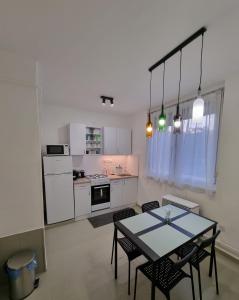 Kuchyň nebo kuchyňský kout v ubytování Barcika Apartman