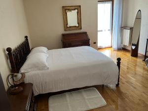 Postel nebo postele na pokoji v ubytování Casa Rina