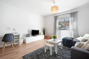 Televízia a/alebo spoločenská miestnosť v ubytovaní Casa Tatiana Vacacional