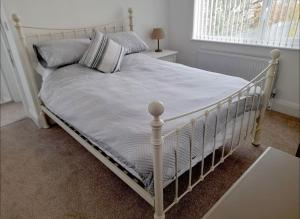 Postel nebo postele na pokoji v ubytování The Retreat