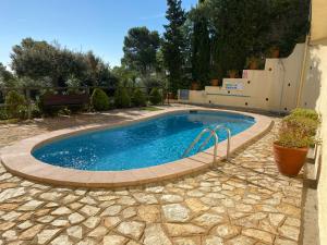Bazén v ubytování Wonderful Apartment with Outstanding Views - Calella de Palfrugell nebo v jeho okolí