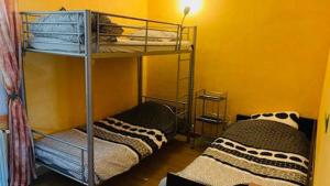Posteľ alebo postele v izbe v ubytovaní La petite maison de Paule