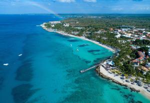 an aerial view of a beach with a rainbow at Viva Dominicus Beach by Wyndham, A Trademark All Inclusive in Bayahibe