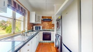 Η κουζίνα ή μικρή κουζίνα στο Montego Bay @ Caribbean Estate +20 φωτογραφίες