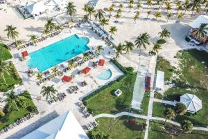 an overhead view of a pool at a resort at Viva Fortuna Beach by Wyndham, A Trademark All Inclusive in Freeport