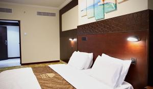 Fotografie z fotogalerie ubytování فندق الفجر البديع واحد للخدمات الفندقيه v destinaci Al Khansāk + 40 fotografií