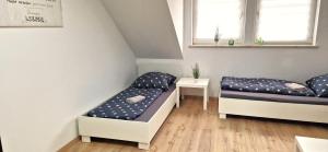 Postel nebo postele na pokoji v ubytování Sson-Appartments + 4 fotografie