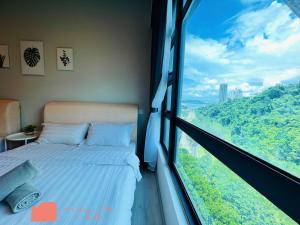 Maison life 小居屋 Jesselton Quay CityPads客房内的一张或多张床位