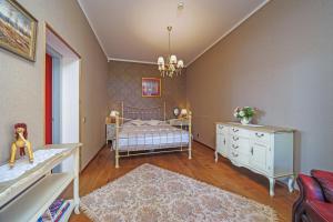 Voodi või voodid majutusasutuse Apartment With a Lake View and Sauna toas
