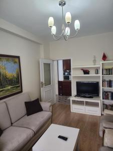 Svetainės erdvė apgyvendinimo įstaigoje Tirana Apartament
