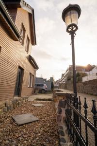 a street light next to a house at Haus Boutique in Bad Salzuflen