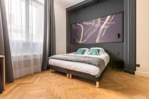 Posteľ alebo postele v izbe v ubytovaní Au Chat Qui Dort Lille - Villa Gounod