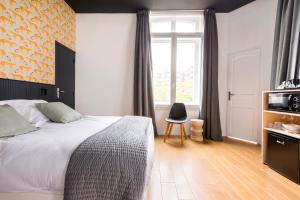 Posteľ alebo postele v izbe v ubytovaní Au Chat Qui Dort Lille - Villa Gounod