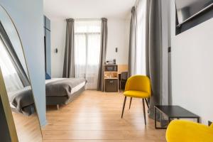 Posteľ alebo postele v izbe v ubytovaní Au Chat Qui Dort Lille - Villa Gounod