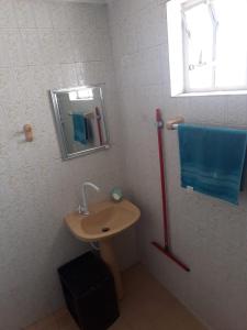 Uma casa de banho em Hostel Bendito Descanso