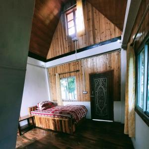 Postel nebo postele na pokoji v ubytování Bae Lae View Homestay