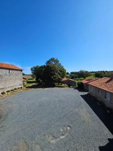 an empty road in the middle of a village at La Commanderie Grand Gite 10kms " Puy duFou" in Mauléon