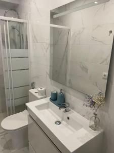 Koupelna v ubytování Dafundo Family Flat